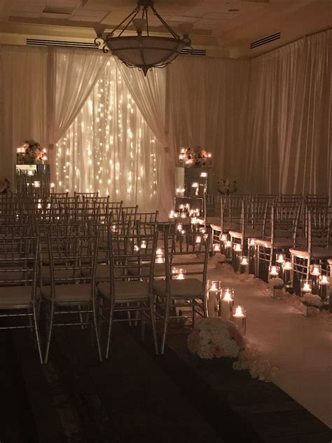 Elegant Candlelit Wedding Ceremony #weddingarch | Inside weddings ceremony, Candlelit wedding ...