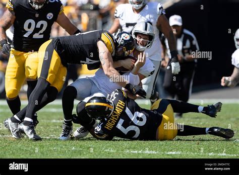 Las Vegas Raiders quarterback Derek Carr (4) is tackled during an NFL ...