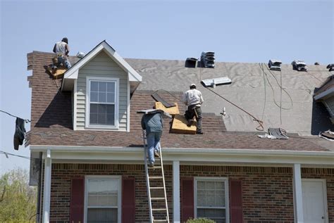 Roofers working - Roofing and Roof Repair Company