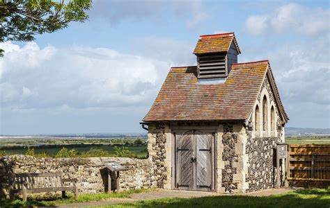 The Charnel House, located in a corner of the graveyard at St Helen's ...