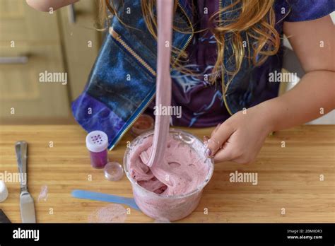 Kids have fun learning at home making slime in a creative science ...