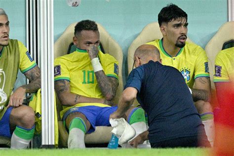 Neymar injury: Brazil team doctor urges calm as star forward is ruled ...