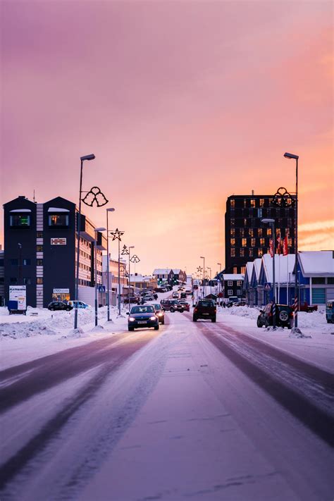 Traffic on the main road in Nuuk, Greenland on a beautiful winter sunset afternoon. Photo by ...