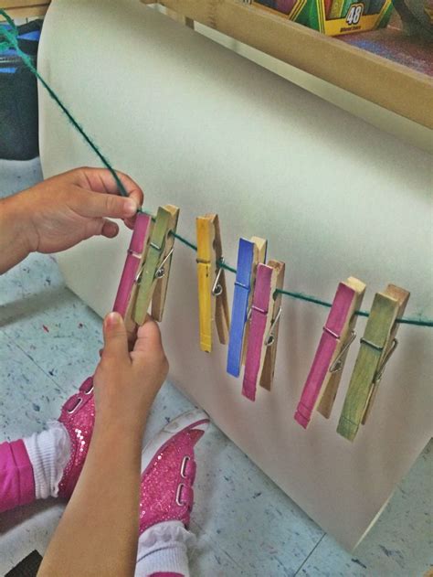 The clothespin activity strengthens muscles used for a pincer grasp. A ...