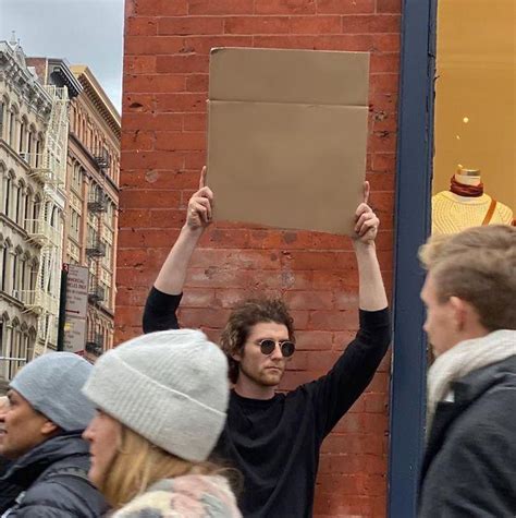 Guy Holding Cardboard Sign Meme Template