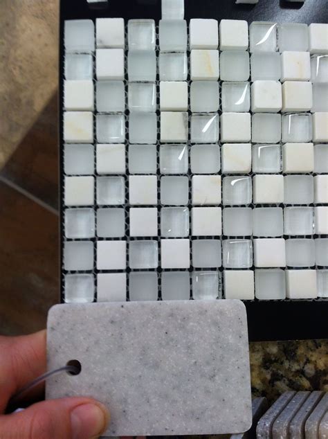 Backsplash tile and "blizzard" onyx vanity countertop | Onyx countertops, Vanity countertop ...