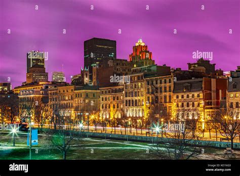 The Old Port section of Montreal City at night with a dramatic and ...