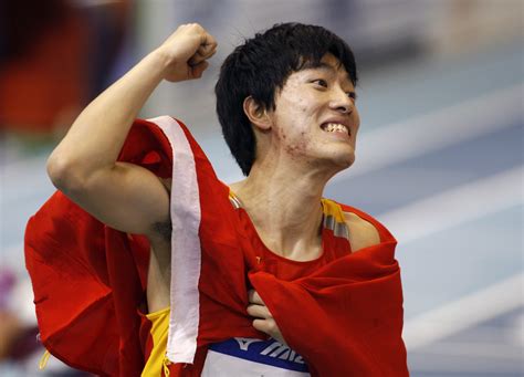 Liu Xiang wins gold in men's 60m hurdles at indoor worlds