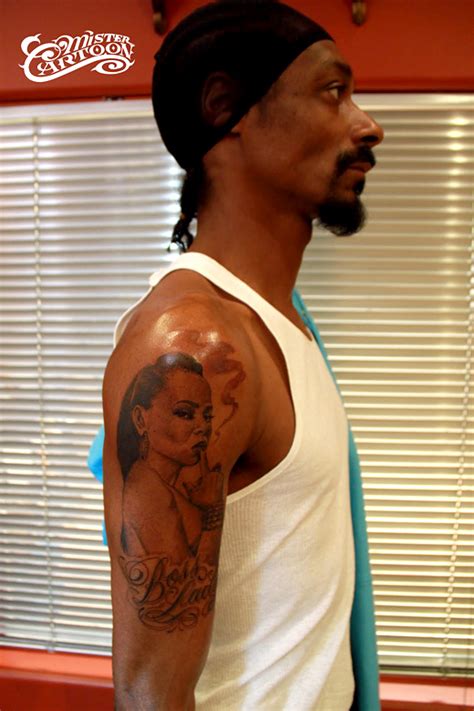 Snoop Dogg’s 6 Tattoos & Their Meanings - Body Art Guru