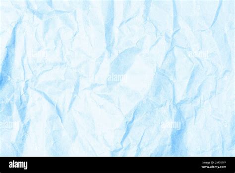 Light blue crumpled paper texture, background. Space for text Stock Photo - Alamy