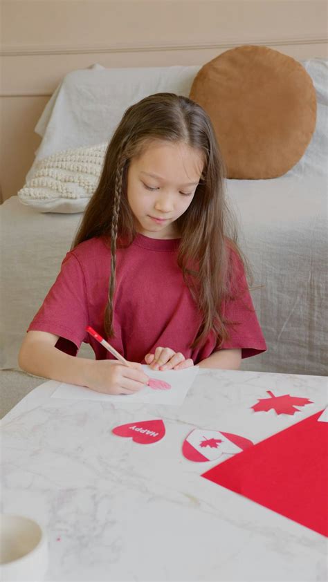 A Girl Coloring a Heart · Free Stock Video