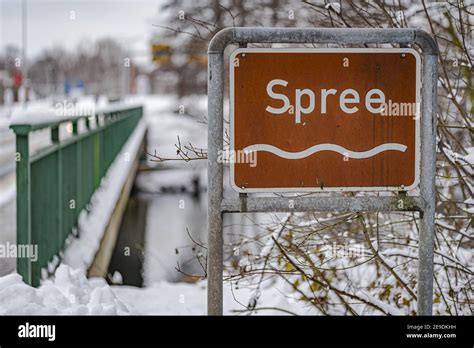 Sign with the name 'Spree' in front of a bridge in Cottbus Stock Photo ...