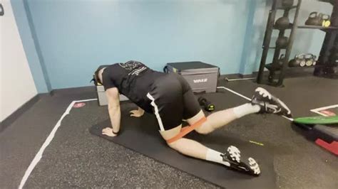 Resistance Band Glute Kickback | myworkouts.io