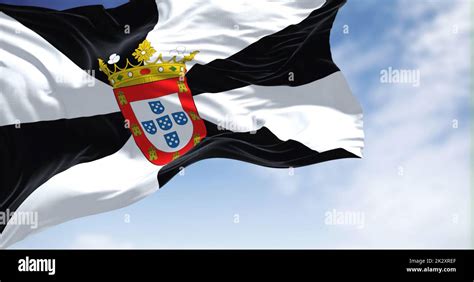 Rear view of Ceuta city flag waving in the wind on a clear day Stock ...