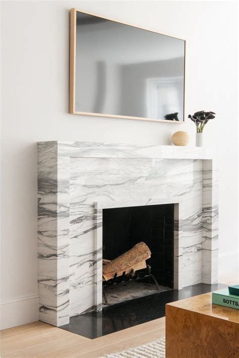 Pin by monica salvador on Florie | Marble fireplace surround, Fireplace design, Contemporary ...