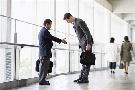 Handshake, bow, or kiss? A global guide to business etiquette - City AM