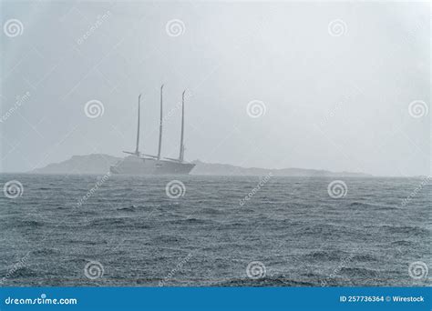 Sailing Yacht a in Rainy Weather Stock Photo - Image of blue ...