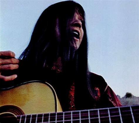 Melanie Safka 1972 - A man with long hair playing a guitar - PICRYL ...