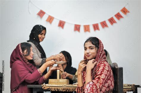 Happy Muslim family celebrating Eid Mubarak Stock Photo | Adobe Stock