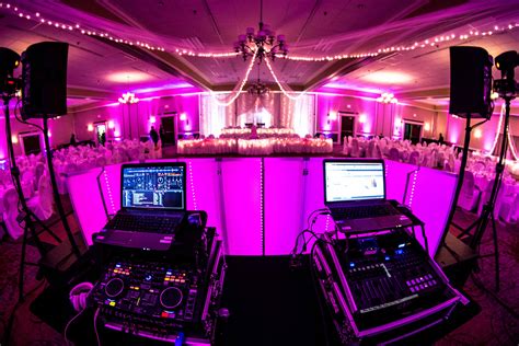 From behind the DJ booth. Photo credit and pink uplighting Courtesy of Sound Express ...