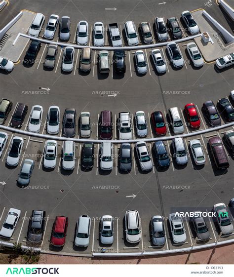 An aerial view of cars parked in the car park, service parking lot, car ...