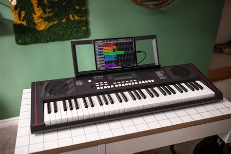 Costco Members Roland E-X10 Arranger Keyboard with Music Rest and Power ...