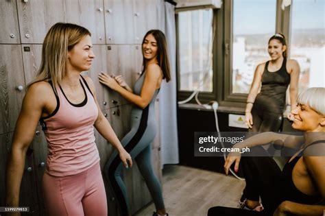 Group Of Women Changing Clothes In The Gym Locker Room High-Res Stock Photo - Getty Images