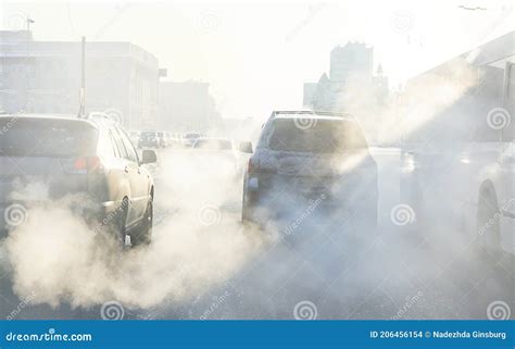 Air Pollution from Exhaust Fumes from Cars in the City, on a Cold Day ...