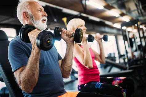 Fit senior sporty couple working out together at gym | For Seniors Magazine