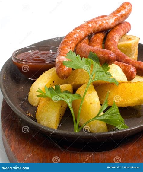 Grilled sausage platter stock photo. Image of sauerkraut - 2441372