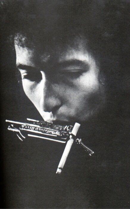 Bob Dylan with cigarette in harmonica holder, during soundcheck, Philadelphia, Pa., 1964 ...