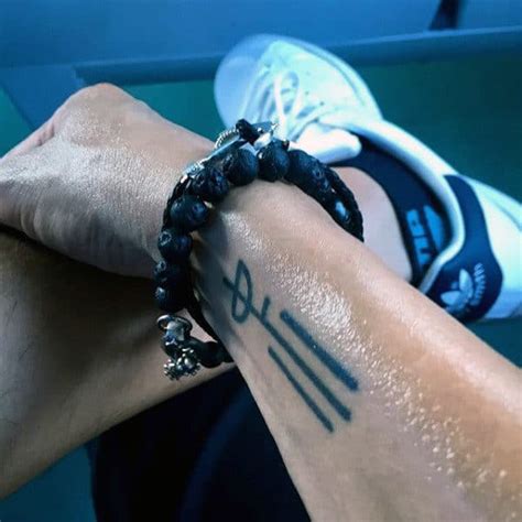 30 Wrist Tattoos For Men - Masculine Design Ideas