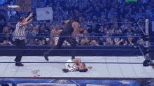 Undertaker Tank Top GIF - Undertaker Tank Top Taking Off Shirt - Discover & Share GIFs