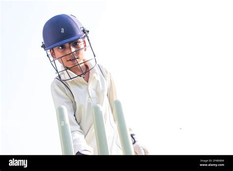 Wicket keeper helmet hi-res stock photography and images - Alamy