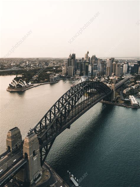 Aerial view of the Harbour Bridge at sunrise, Sydney - Stock Image ...