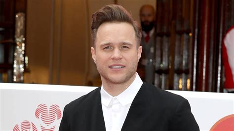 Olly Murs' pain after twin Ben 'changes his number' 10 years after X Factor wedding snub - Heart