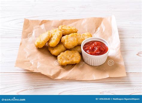 Chicken nuggets with sauce stock photo. Image of unhealthy - 149630640