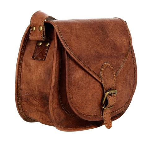 curved brown leather saddle bag by paper high | notonthehighstreet.com