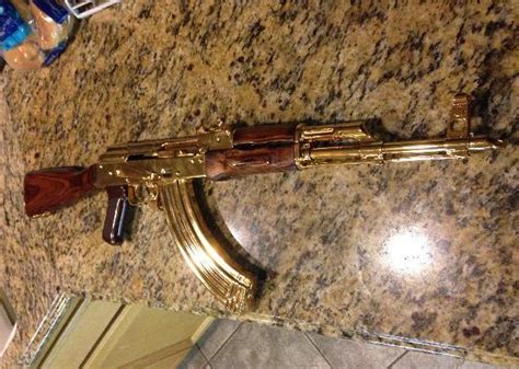 GOLD PLATED AK 47 - Black Market arms sales