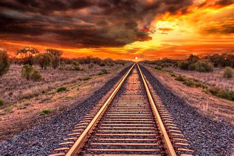 "Train track to sunset" by Chris Brunton | Redbubble