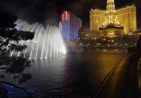 Bellagio Hotel Fountains At Night Photograph by Merridy Jeffery