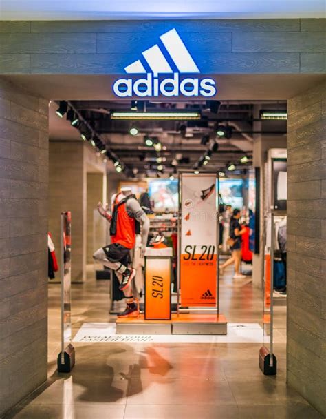 Front Entrance To Adidas Store in Singapore Shopping Mall Editorial Photography - Image of ...