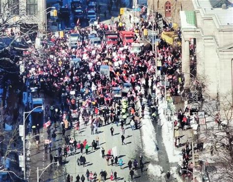 Man charged during vaccine mandates protest in downtown Toronto as road ...