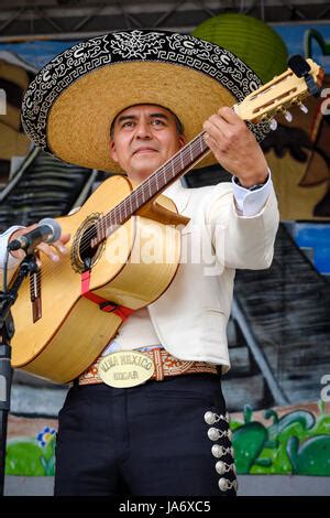 Sombrero-wearing mariachi band guitar player, "Dieciseis de Septiembre ...