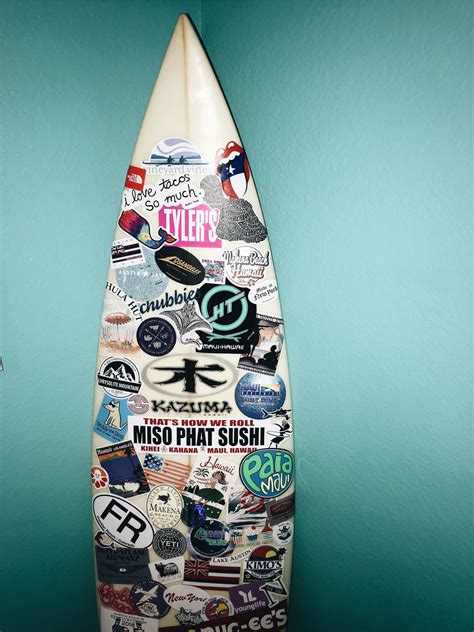 surfboard with stickers really cute room decor diy old surfboard ...