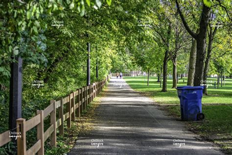 People Walking in Distance in the River Park Riverwalk, Albany Park - ChiStockImages.com