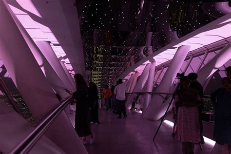 People inside the dimly lit Sky Bridge | Sky Bridge | Riyadh | Travel ...