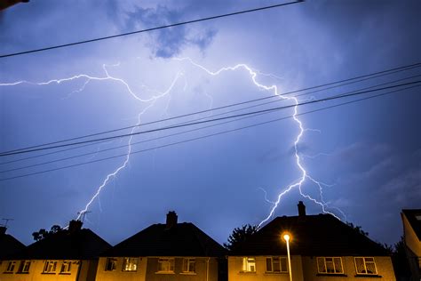 'Sign From God': Shocking Moment Lightning Strikes House During Viewing ...