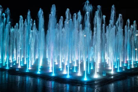 A Colored Fountain with Illumination at Night. Background. Stock Image ...