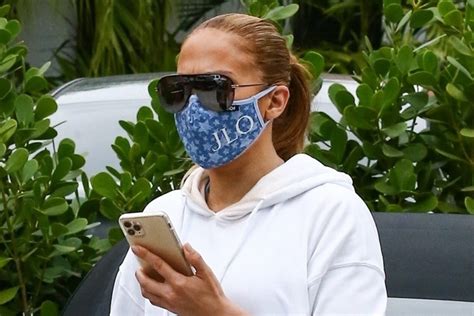 Jennifer Lopez debuts custom crystal-embellished face mask